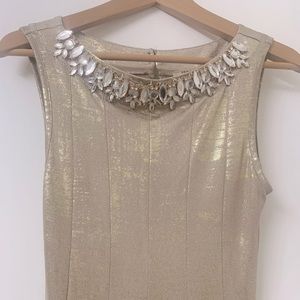 Beautiful Evening gown Gold shimmer adorned with rhinestones on collar by Haani